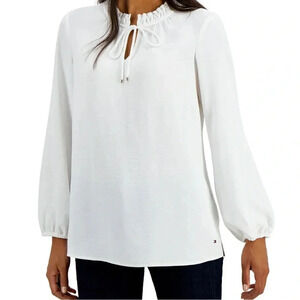 Tommy Hilfiger top, created a solid-color style that's wearable. Size X-large